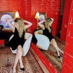 red room black dress looking down